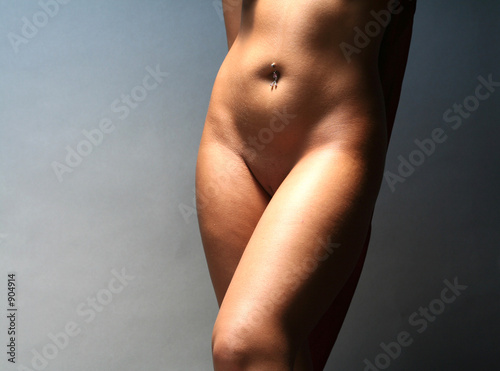 young woman posing in erotic style