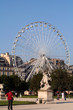 big wheel and statue big wheel and statue
