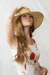 portrait of the girl in a straw hat