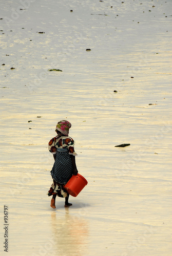 lady walking on beach