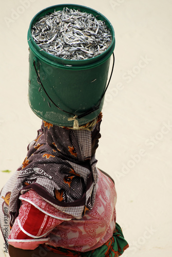 local lady with bucket on head