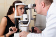 male ophthalmologist conducting an eye examination