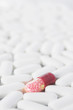one red pill in many white pills