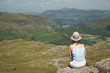 woman at rest in lake district,focus on woman