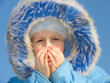 girl trying to warm fingers