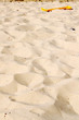 rateau dans le sable
