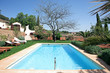 luxury rustic hotel and swimming pool in countryside