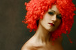 portrait in a red wig