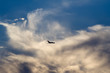 Photo: air-liner in evening cloudy sky air-liner in evening cloudy sky