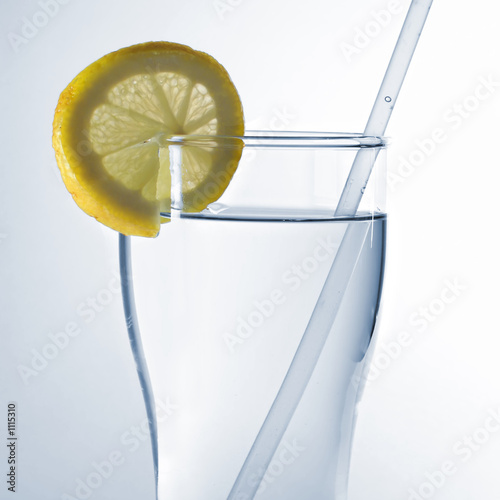 glass of water with lemon slice