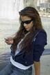 girl listening to mp3 player