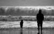 father watching son