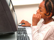 girl using home computer