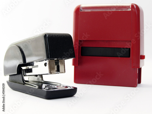 Foto: stapler and stamp stapler and stamp