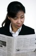 asian businesswoman reading
