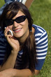 girl on cellphone in the park