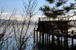pier with boat house on lake tahoe