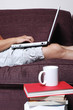 laptop, books, and a cup of coffee laptop, books, and a cup of coffee