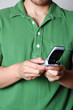 man text messaging on cell phone man text messaging on cell phone