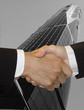 male to female - handshake over a skyscraper