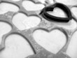 heart-shaped cookie cutter and dough
