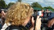 crowd  of photographers in rush/in show/movie/tv