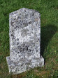 old tombstone in a graveyard