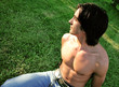 mucle boy on grass