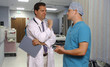 doctor and surgeon meet in recovery room