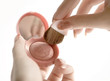 rouge in hands