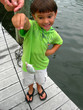 boy catching first fish