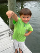 boy catching first fish