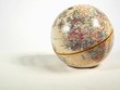 globe and sand