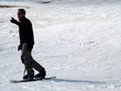 man snowboarding