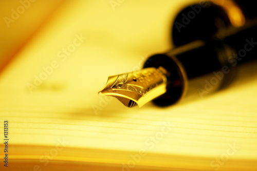 Photo: pen and notebook pen and notebook