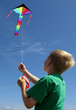 boy flying kite