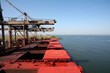 Foto: unloading ship unloading ship