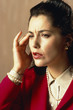 Photo: woman with headache under stress woman with headache under stress