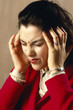 Photo: woman with headache under stress woman with headache under stress