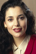 Photo: portrait of business woman looking at camera portrait of business woman looking at camera