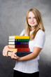 Foto: girl carrying books girl carrying books