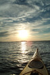 kayaking into sunset