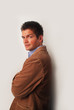 man with brown jacket
