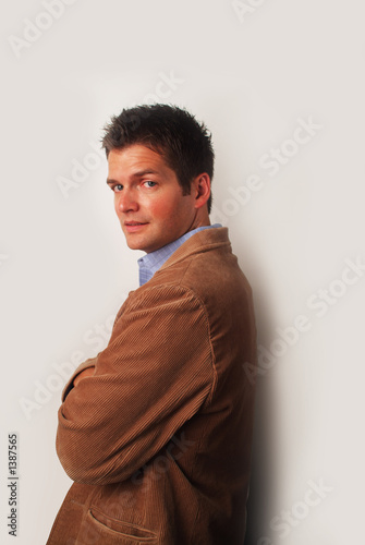 Photo: man with brown jacket man with brown jacket