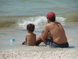 father and son at the beach 2