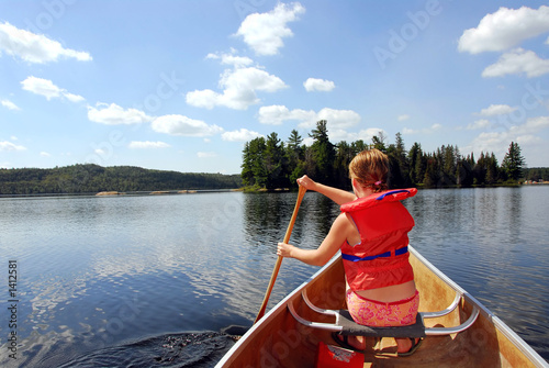 Photo: child in canoe child in canoe