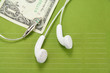white headphones with dollar