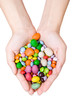Foto: woman's hands with sweets woman's hands with sweets