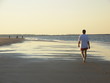 man walking on beach