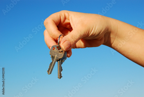 Photo: keys in hand keys in hand